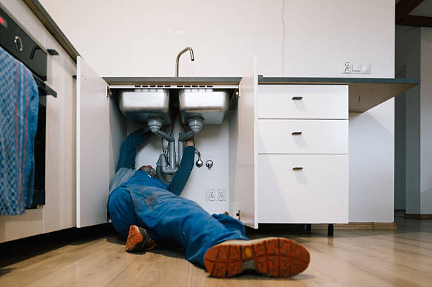 Professional Drain Cleaning technician working in Durant, OK